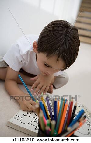 Portrait of a boy coloring. View Large Photo Image Stock Image - Portrait of a boy coloring.. Fotosearch