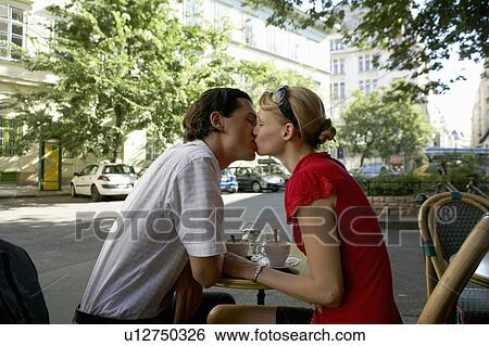 Couple at a restaurant together. View Large Photo Image Stock Photograph - Couple at a restaurant together.. Fotosearch