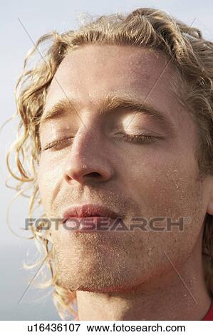 Close up of Young male runners face. View Large Photo Image Stock Photo - Close up of Young male runners face.. Fotosearch