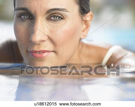 Portrait of woman in hotel pool View Large Photo Image Stock Photography - Portrait of woman in hotel pool . Fotosearch
