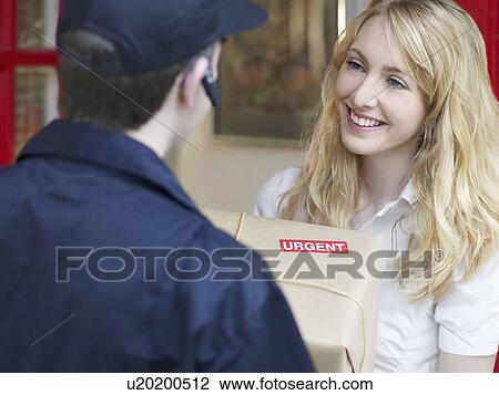 Woman receiving urgent delivery View Large Photo Image Stock Image - Woman receiving urgent delivery. Fotosearch