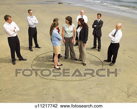 Group of businesspeople on the beach. View Large Photo Image Stock Image - Group of businesspeople on the beach.. Fotosearch