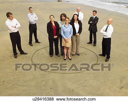 Group of businesspeople on the beach. View Large Photo Image Stock Photo - Group of businesspeople on the beach.. Fotosearch