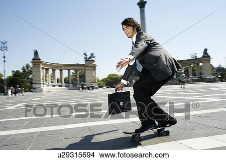 Picture - Young man on skateboard.. Fotosearch