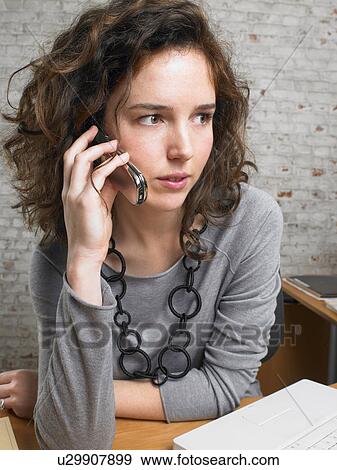 Businesswoman talking on the phone., Brussels, Belgium. View Large Photo Image Stock Photo - Businesswoman talking on the phone., Brussels, Belgium.. Fotosearch