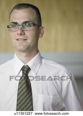 Stock Photo - Businessman in an office. Fotosearch