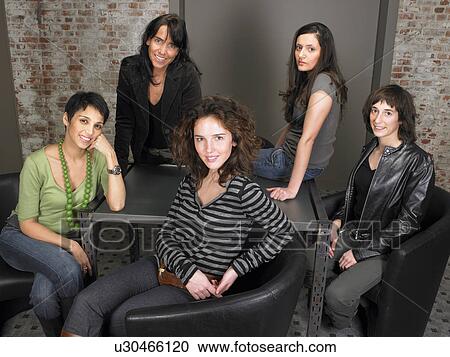 Stock Image - Portrait of female business team. Brussels, Belgium.. Fotosearch