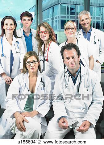 Group shot of seven doctors. View Large Photo Image Stock Image - Group shot of seven doctors.. Fotosearch