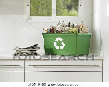 Stock Image - Still life of recycling in a domestic kitchen, close up. Fotosearch