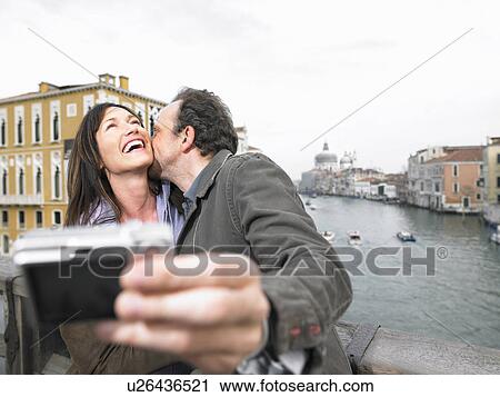 Couple taking self portrait on Academia Bridge. Grand Canal, Venice, Italy. View Large Photo Image Stock Image - Couple taking self portrait on Academia Bridge. Grand Canal, Venice, Italy.. Fotosearch