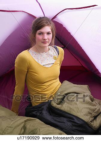 Girl sitting in sleeping bag in pink tent View Large Photo Image Stock Photo - Girl sitting in sleeping bag in pink tent. Fotosearch