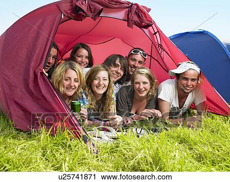 Group of people lying in tent View Large Photo Image Stock Image - Group of people lying in tent. Fotosearch