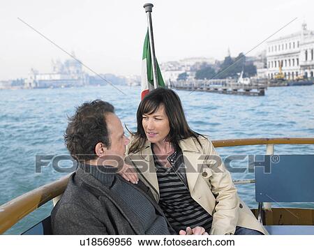 Couple on vaporetto boat. Venice, Italy. View Large Photo Image Stock Photograph - Couple on vaporetto boat. Venice, Italy.. Fotosearch