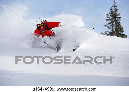 Austria, Saalbach, male skier turning in snow on slope View Large Photo Image Stock Photography - Austria, Saalbach, male skier turning in snow on slope. Fotosearch