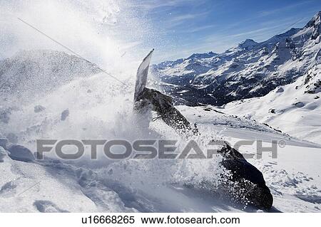 Male snowboarder falling over on mountain View Large Photo Image Stock Photography - Male snowboarder falling over on mountain. Fotosearch