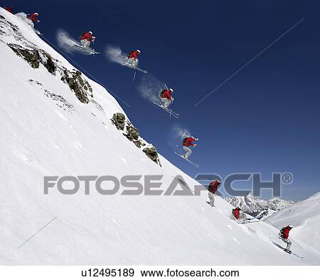Stock Photo - Sequence of male skier jumping down steep slope (Digital Composite). Fotosearch