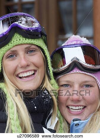 Two young blonde women in ski-wear, close-up, portrait View Large Photo Image Stock Photo - Two young blonde women in ski-wear, close-up, portrait. Fotosearch