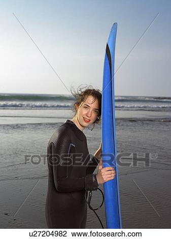 Portrait of a female surfer. View Large Photo Image Stock Image - Portrait of a female surfer.. Fotosearch