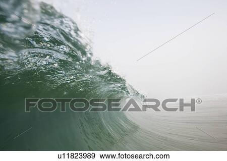 Stock Photo - The crest of a wave.. Fotosearch