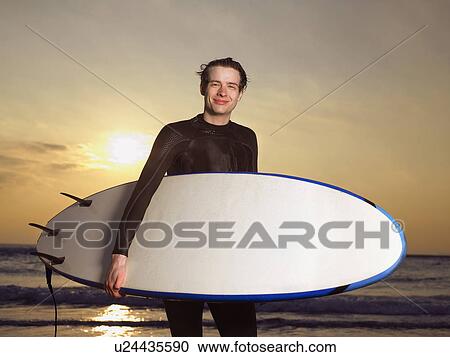 Portrait of a male surfer. View Large Photo Image Stock Image - Portrait of a male surfer.. Fotosearch