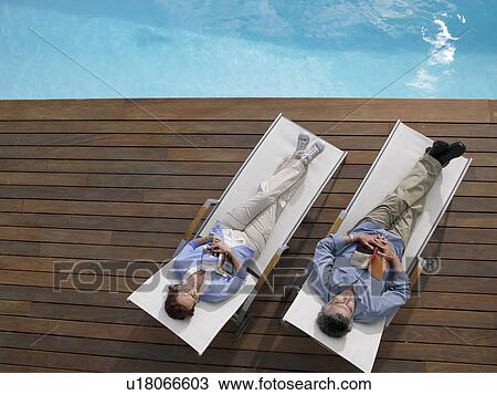 Mature couple relaxing View Large Photo Image Stock Image - Mature couple relaxing. Fotosearch