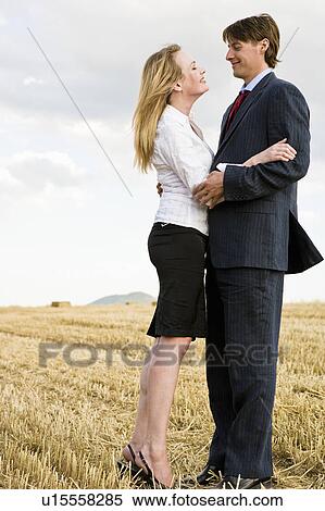 Couple in a wheat field. View Large Photo Image Stock Photography - Couple in a wheat field.. Fotosearch