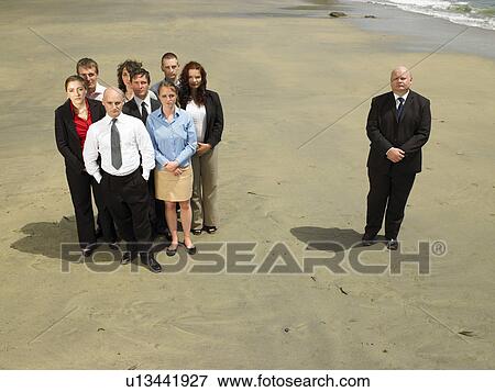 Group of businesspeople on the beach. View Large Photo Image Stock Photo - Group of businesspeople on the beach.. Fotosearch