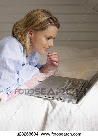 Businesswoman working from home View Large Photo Image Picture - Businesswoman working from home. Fotosearch