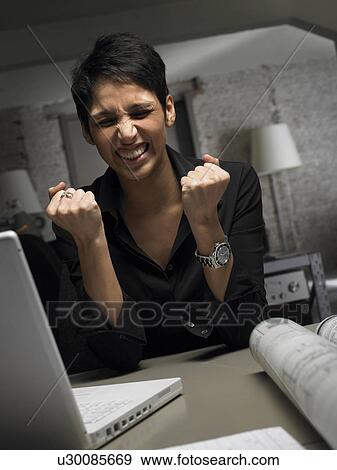 Very angry female architect at desk, Brussels, Belgium. View Large Photo Image Stock Photo - Very angry female architect at desk, Brussels, Belgium.. Fotosearch