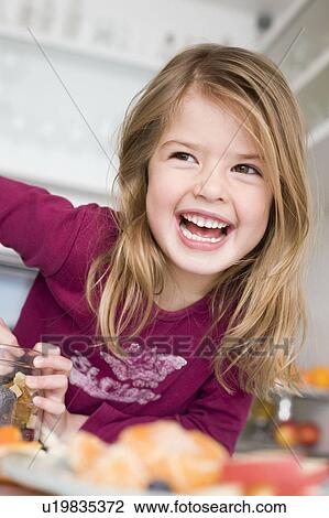 Stock Image - Girl laughing . Fotosearch