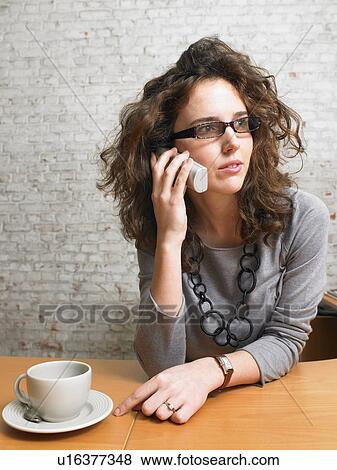 Businesswoman talking on the phone., Brussels, Belgium. View Large Photo Image Stock Photo - Businesswoman talking on the phone., Brussels, Belgium.. Fotosearch