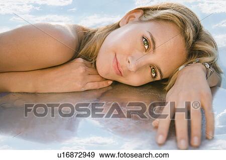 Portrait of a young woman. View Large Photo Image Stock Photo - Portrait of a young woman.. Fotosearch