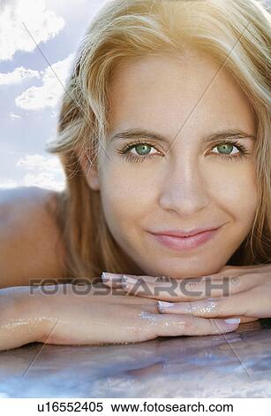 Stock Photography - Portrait of a young woman.. Fotosearch