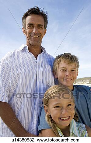 A father with his children View Large Photo Image Stock Image - A father with his children. Fotosearch