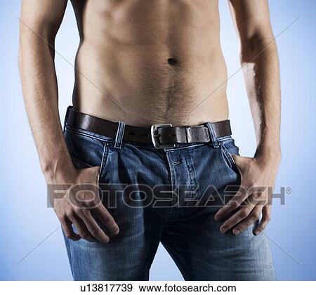 A young man, midriff View Large Photo Image Stock Photo - A young man, midriff. Fotosearch