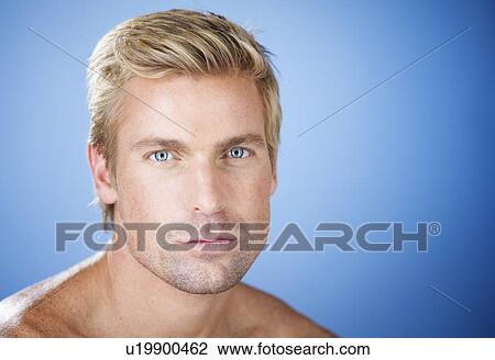 Stock Image - Portrait of a young man. Fotosearch