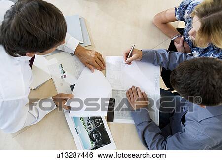 A young couple buying a new car View Large Photo Image Stock Photograph - A young couple buying a new car. Fotosearch