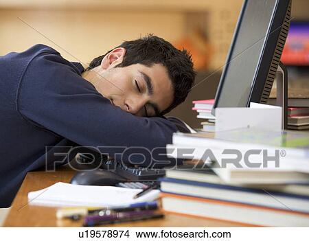 A teenage boy asleep at a computer View Large Photo Image Picture - A teenage boy asleep at a computer. Fotosearch
