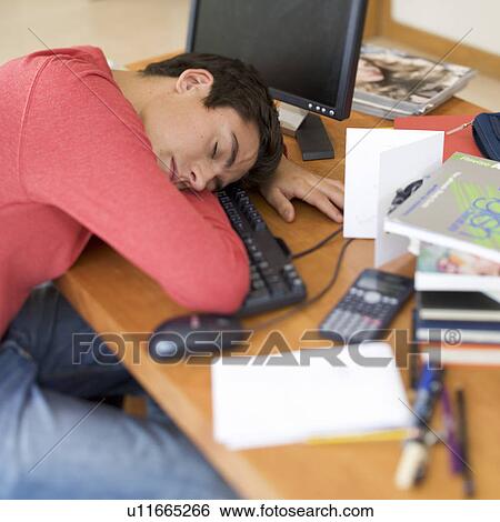A teenage boy asleep at a computer View Large Photo Image Stock Photograph - A teenage boy asleep at a computer. Fotosearch