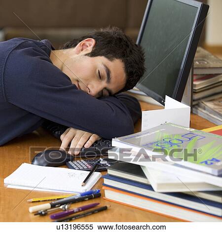 A teenage boy asleep at a computer View Large Photo Image Stock Photography - A teenage boy asleep at a computer. Fotosearch