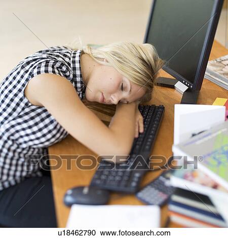 A teenage girl asleep at a computer View Large Photo Image Stock Image - A teenage girl asleep at a computer. Fotosearch