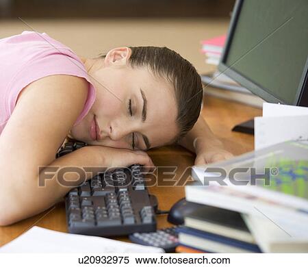 A teenage girl asleep at a computer View Large Photo Image Stock Photography - A teenage girl asleep at a computer. Fotosearch