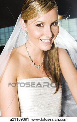 A bride sitting in the back of a car View Large Photo Image Stock Image - A bride sitting in the back of a car. Fotosearch