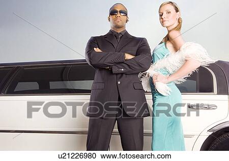 Stock Image - A chauffer and his passenger. Fotosearch