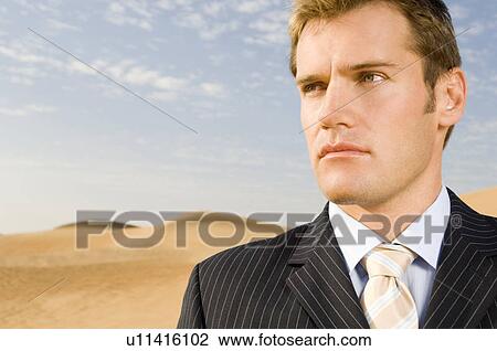 Portrait of a man in a suit View Large Photo Image Stock Image - Portrait of a man in a suit. Fotosearch