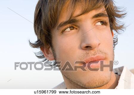 Portrait of a young man View Large Photo Image Stock Photo - Portrait of a young man. Fotosearch