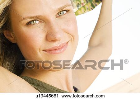 Stock Image - Portrait of a young woman. Fotosearch