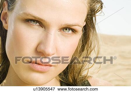 Portrait of a young woman View Large Photo Image Stock Photo - Portrait of a young woman. Fotosearch