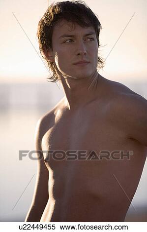 Portrait of a young man View Large Photo Image Stock Photography - Portrait of a young man. Fotosearch