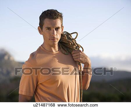 Stock Photo - Portrait of a climber. Fotosearch